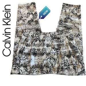 Calvin Klein new with tag black tan snake print tapered slacks pants size medium